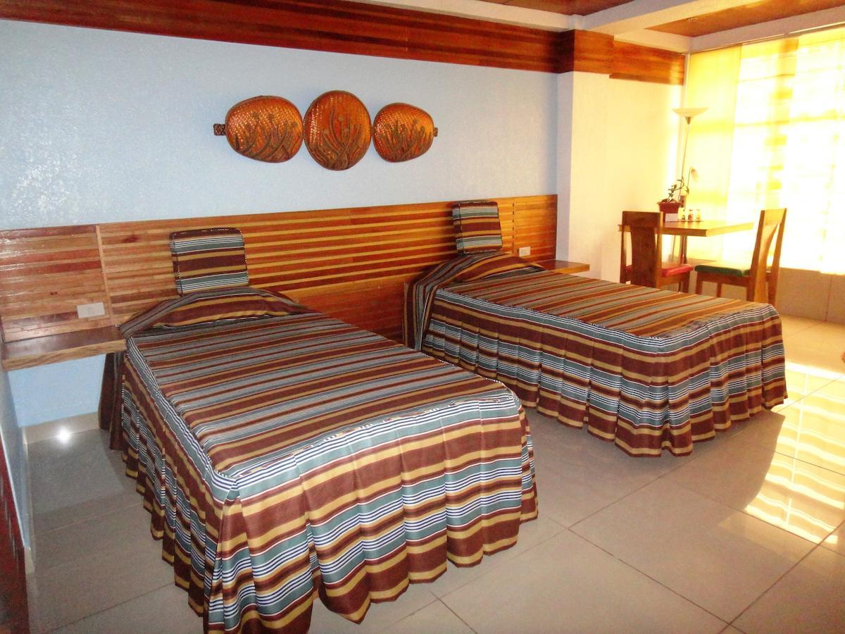 Citi Hotel Hilongos Стая снимка